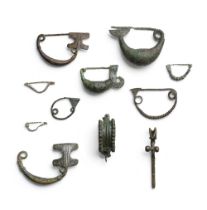 Ten European bronze fibulae and a silver fibula 11