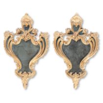 A pair of early 19th century Italian wall mirrors