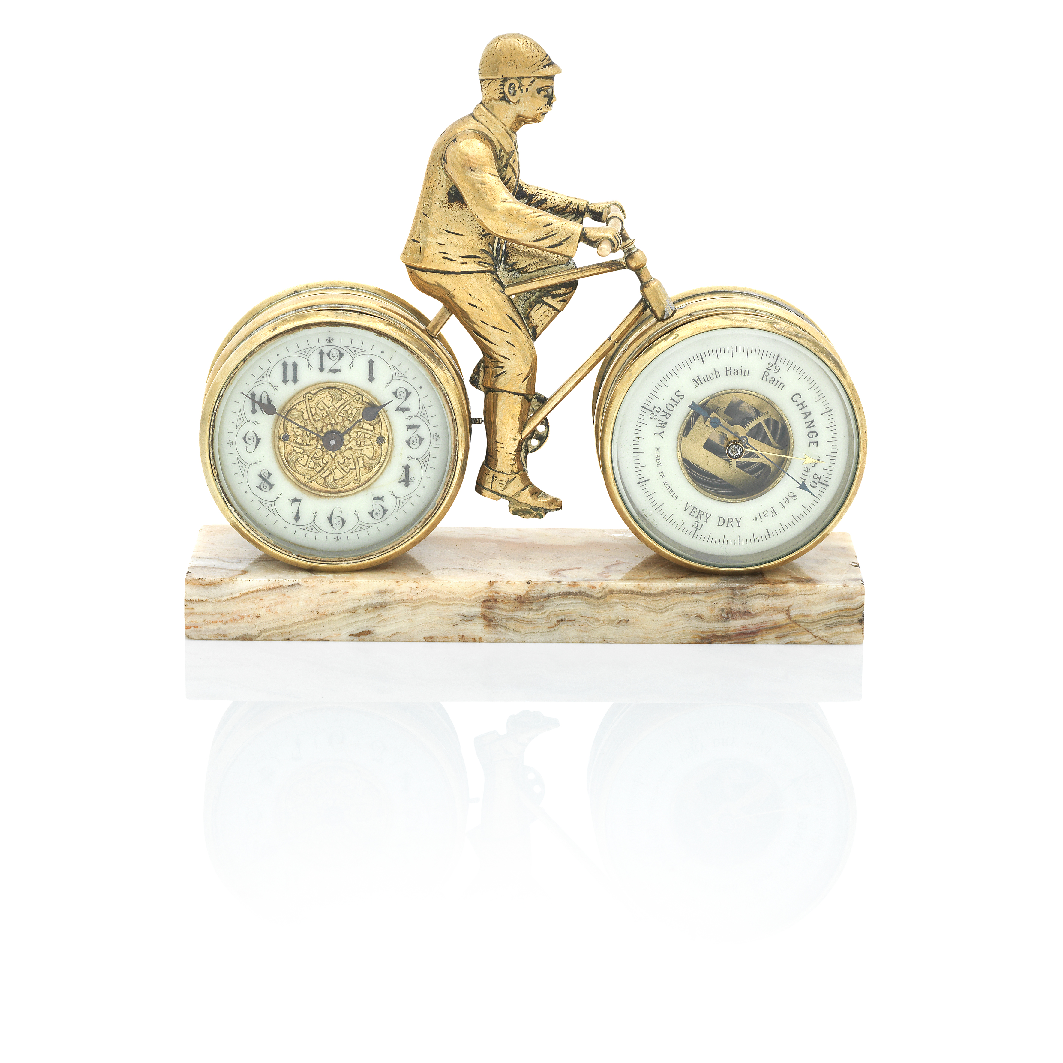 A late 19th/early 20th century Novelty cyclist timepiece/barometer desk compendium