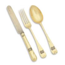 A silver gilt Christening knife, fork and spoon set by Sebastien Harry Garrard, London 1912