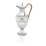 A George III silver hot water jug, Maker's mark worn, London, 1774