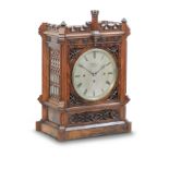 A 19th century 'gothic' walnut mantle Clock Inscribed Rowell of Oxford