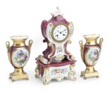 A 19th century French porcelain mantel clock garniture and stand Le Roy, Paris