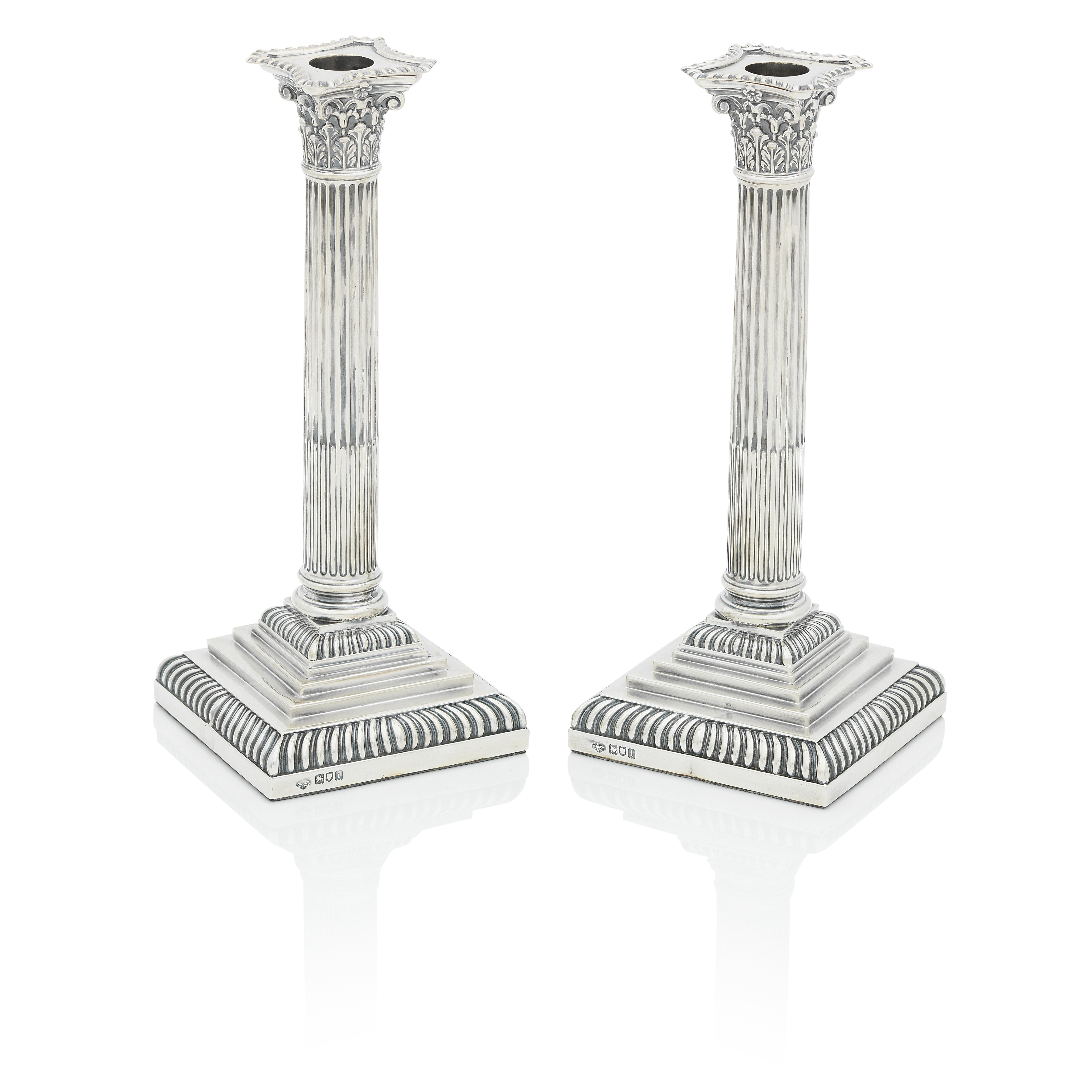A Pair of Edwardian Silver Candlesticks By the Goldsmiths and silversmiths company, London, 1904