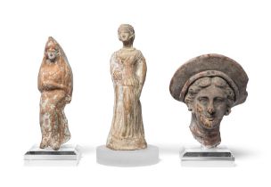 Two Greek terracotta female figures and a Greek terracotta female head 3