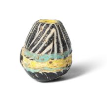 A Roman blue, white and yellow striped piriform glass bead