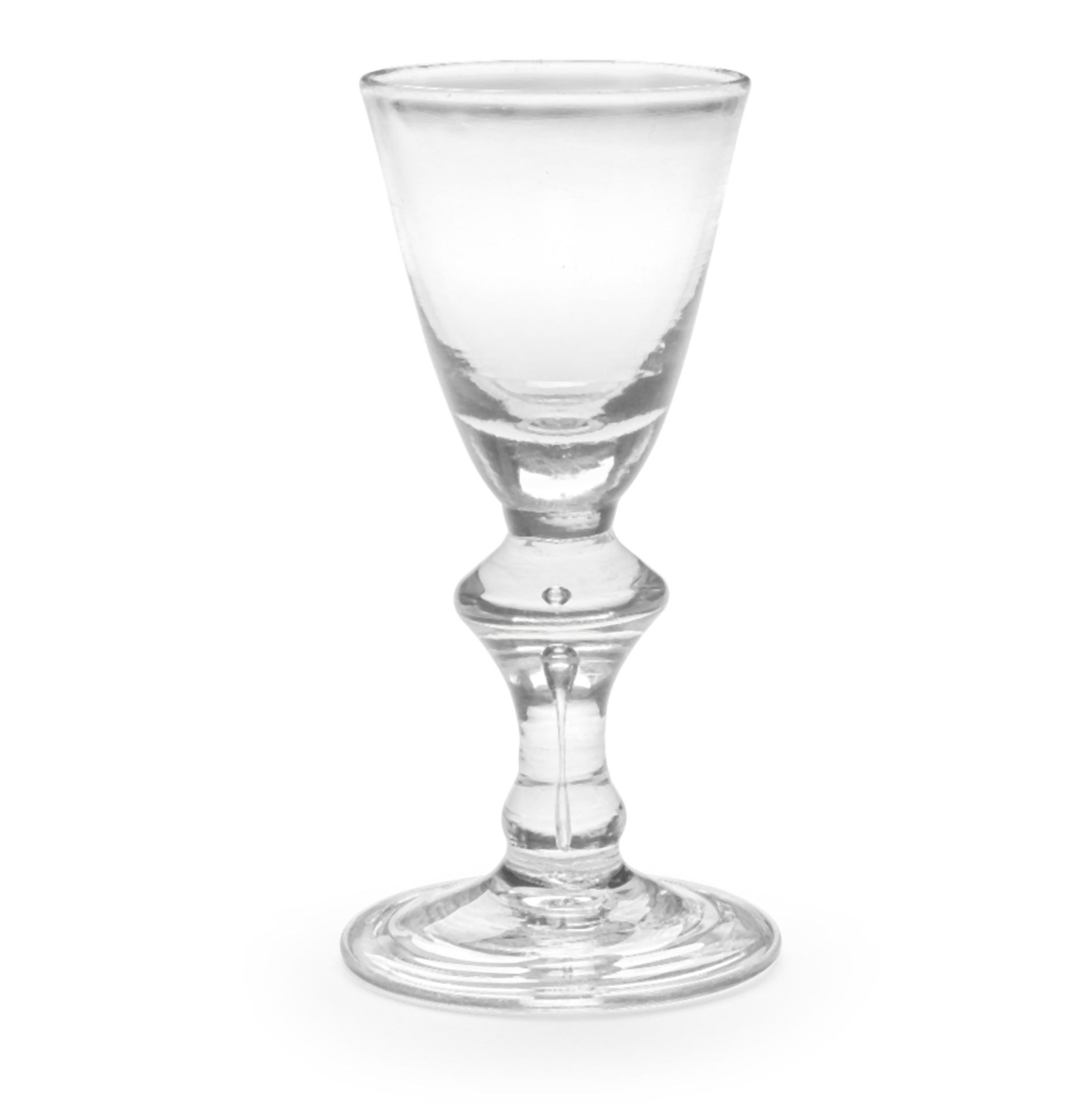 A heavy baluster wine glass, circa 1710-15