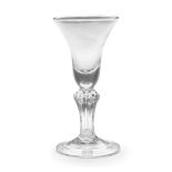 A moulded-stem wine glass, circa 1730-40