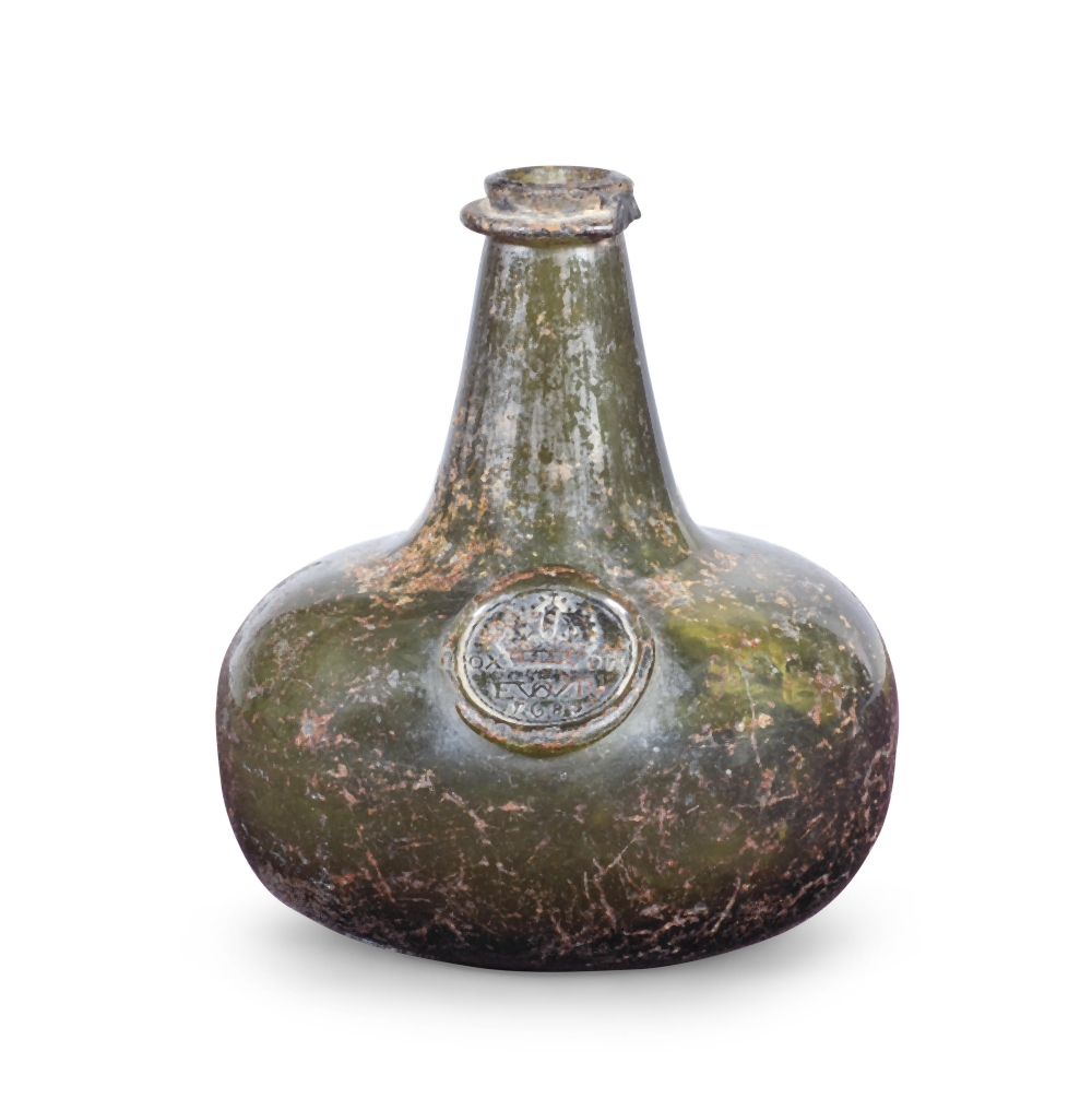 A rare and early sealed half size 'Onion' wine bottle, dated 1688