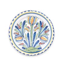 A good Brislington delftware tulip charger, circa 1700-20