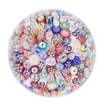 A Baccarat close-packed millefiori paperweight, dated 1848