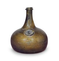 A sealed magnum 'Onion' wine bottle, dated 1708