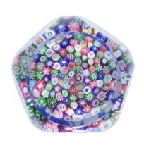 A Clichy faceted close-packed millefiori basket paperweight, circa 1850