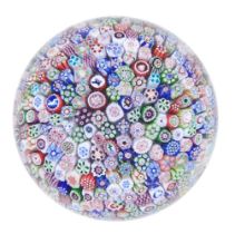A Baccarat close-packed millefiori paperweight, dated 1847
