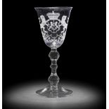 A Dutch engraved armorial light baluster goblet, circa 1750