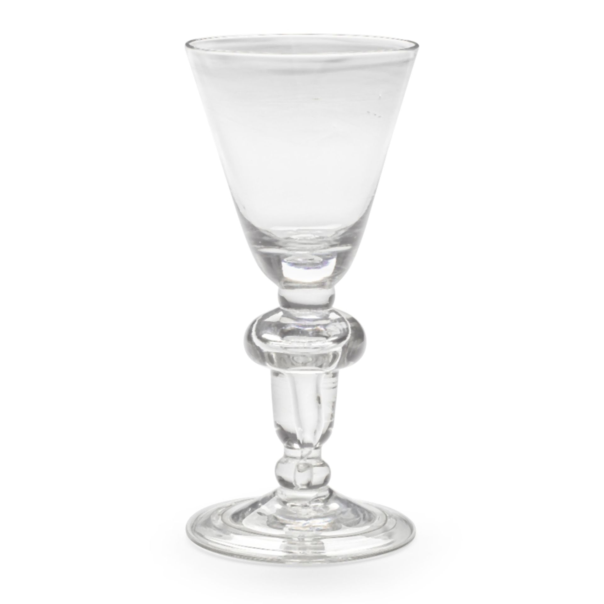 A fine acorn-knopped heavy baluster goblet, circa 1710-15