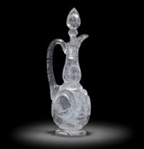 An exceptional Stevens and Williams 'rock crystal' claret jug and stopper by John Orchard, circa...