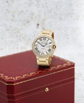 Cartier. A fine 18K gold diamond set automatic calendar bracelet watch Ballon Bleu, Ref: 2999, ...