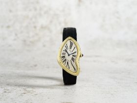 Cartier. A very rare and unusual 18K gold manual wind wristwatch made as part of the Paris 1991 ...
