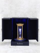 DeBeers. A fine gold plated hourglass with floating diamonds Circa 2000