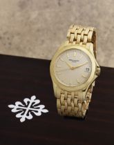 Patek Philippe. A fine 18K gold automatic calendar bracelet watch Calatrava, Ref: 5107/1J-001, ...
