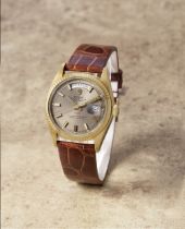 Rolex. A fine and rare 18K gold automatic calendar wristwatch with Qaboos dial retailed by Aspre...