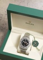 Rolex. An unworn stainless steel automatic calendar bracelet watch with dual time zone Explorer...
