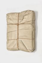 CHRISTO & JEANNE-CLAUDE (1935-2020)(1935-2009) Wrapped book Multiple. Livre emball&#233; dans d...