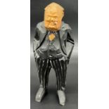 Vintage hand carved and painted Sir Winston Churchill figure. [Signed to base of foot] [18cm high]