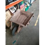 Antique wooden wheel barrow