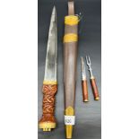 Scottish Dirk dagger with sheath and two smaller utensils. Fitted with carved wooden handle and