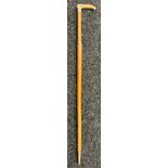 Antique Malacca walking cane fitted with a hidden blade. Horn handle and white metal collar. [