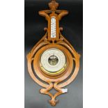 Antique Barometer and thermometer within a hand carved art Nouveau form wood casing. [52cm in