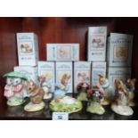 Shelf of Royal Albert Beatrix potter figures mother ladybird , Hunca Munca etc