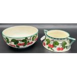 Two antique Wemyss Ware bowls. Wemyss Roslyon flower bowl decorated with cherries, impressed T.Goode