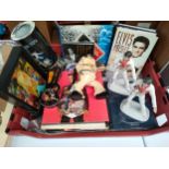 Large collection of Elvis memorabilia includes figures and books etc