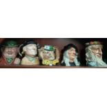 A Collection of Royal Doulton Toby jugs includes the witch , Neptune as found , the march hare etc