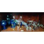 Shelf of art glass wares to include rabbit figure with Cain's and a pair of cobalt blue goblets etc