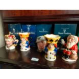 A Collection of Royal Doulton Toby jugs to include King and queens spades and hearts , Santa Klaus