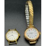 9ct gold cased ladies wristwatch with plated elasticated strap. Together with a vintage ladies