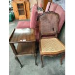 Vintage rattan ornate chair together with side unit .