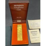 Vintage Ronson Varaflame gas lighter with original box and instruction manual.