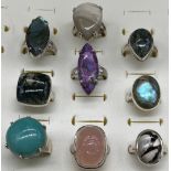 A Lot of nine 925 silver and agate style stone rings.