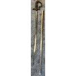 A German Cavalry sword, Lion head pommel. Comes with a scabbard- not true to this sword.