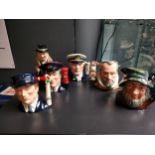 A Collection of small Royal doulton Toby jugs includes Winston Churchill , the Canadian sailor , Rip
