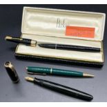 Three Vintage Parker Fountain pens and revolving pencil. Includes fountain pen with 14ct yellow gold