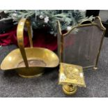 Antique brass swing handle log basket, Brass ornate trivet stand and brass three section fire