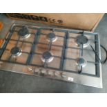 Viceroy gas hob with accessories.