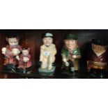 Shelf of Royal Doulton Toby jugs includes sir Francis Drake and Sherlock Holmes