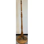 Light wood floor standing lamp fitted with A Military Naval brass propeller. Stamped Banford & Co